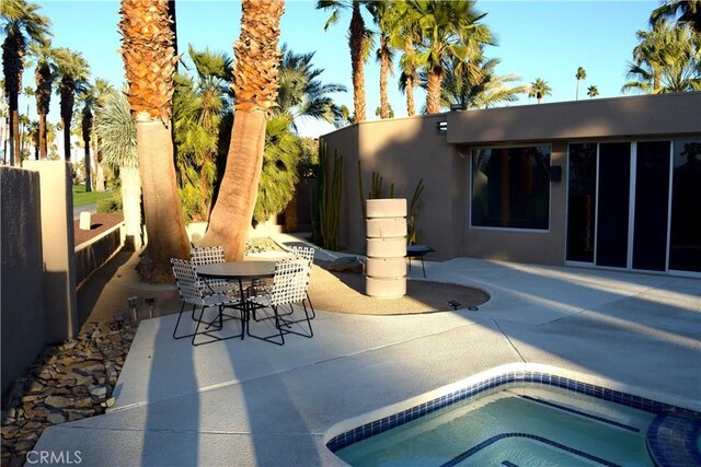 view of patio featuring a hot tub