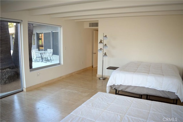 bedroom with beamed ceiling