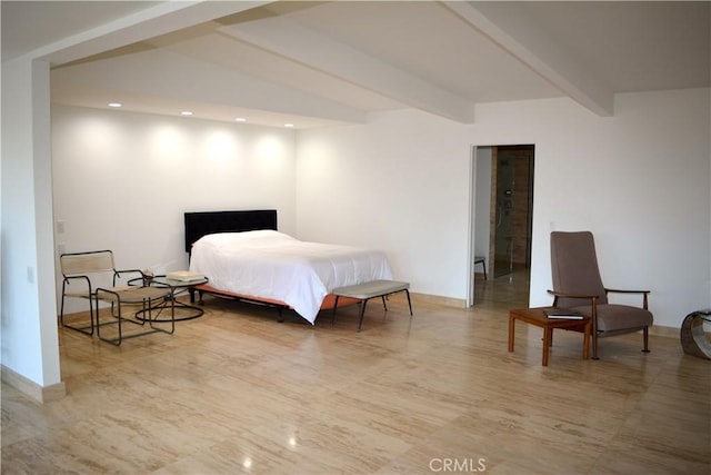 bedroom featuring beam ceiling