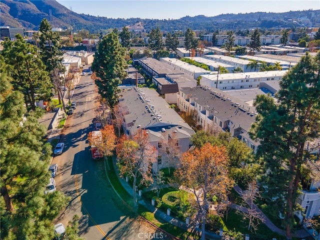 drone / aerial view featuring a mountain view