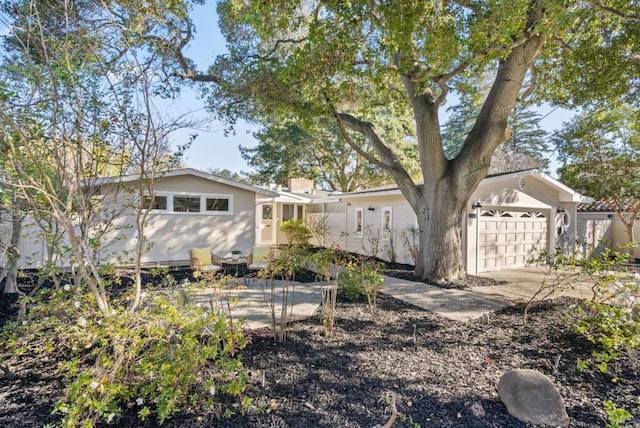 exterior space featuring a garage