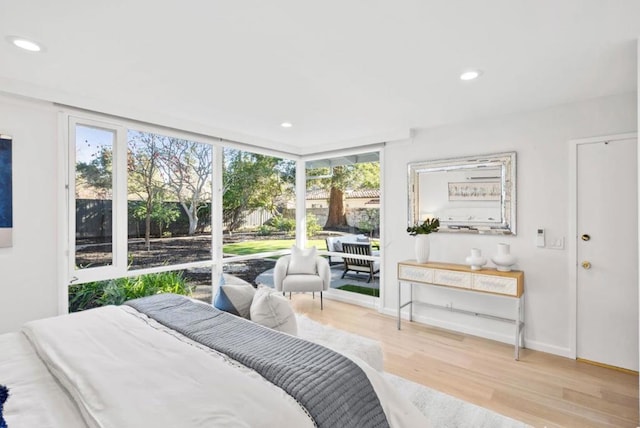 sunroom / solarium featuring a healthy amount of sunlight