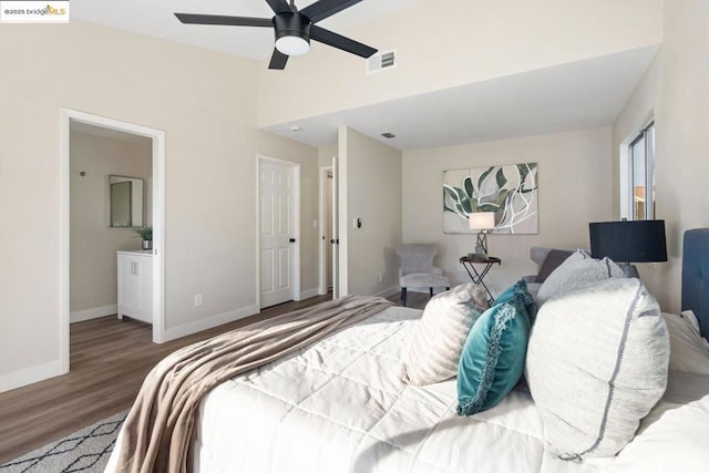 bedroom with wood-type flooring and ceiling fan