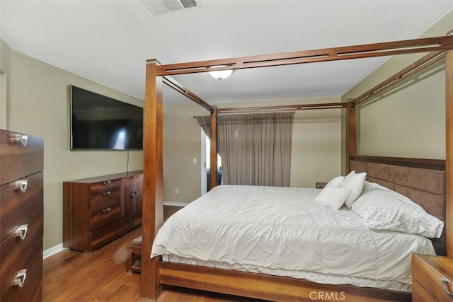 bedroom featuring hardwood / wood-style flooring