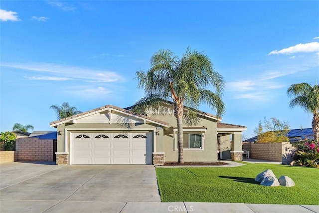 single story home featuring a front yard and a garage