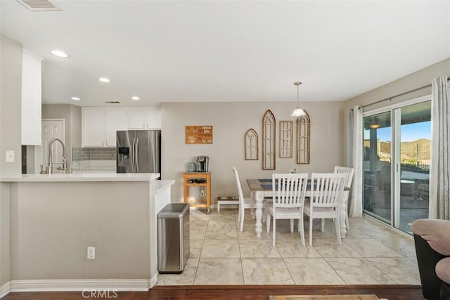 dining area featuring sink