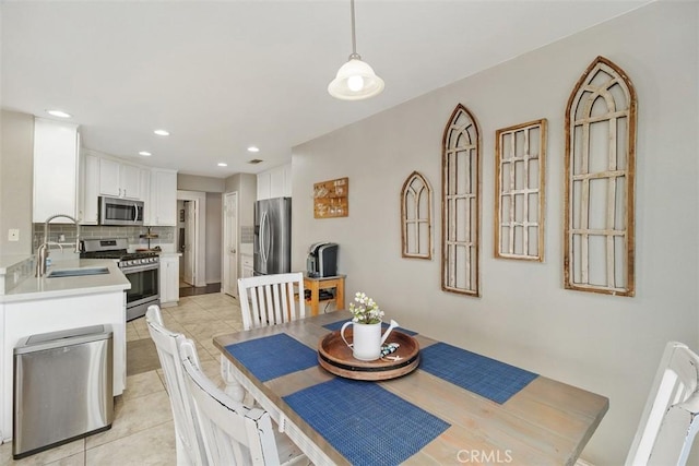 tiled dining area with sink