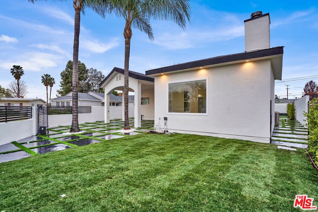 view of front of home with a front yard