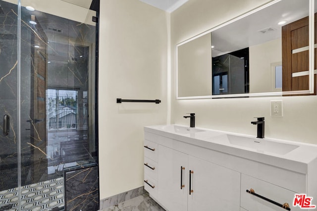 bathroom featuring walk in shower and vanity