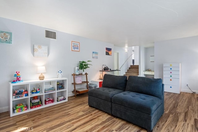 living room with hardwood / wood-style flooring