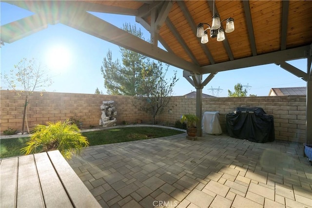 view of patio featuring a gazebo and a grill