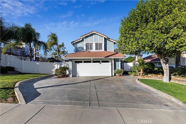 view of front facade with a front lawn and a garage