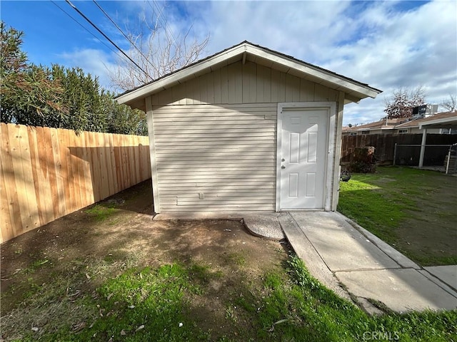 view of outdoor structure with a yard