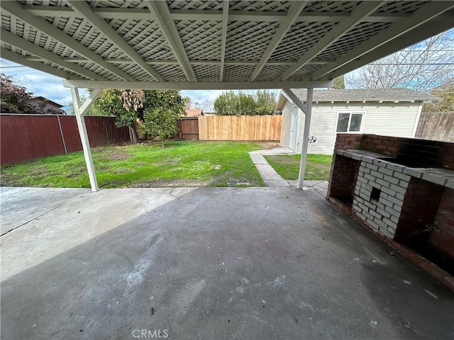 view of patio featuring an outdoor structure