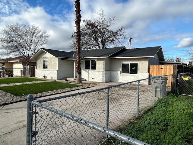 view of front of property with a front lawn