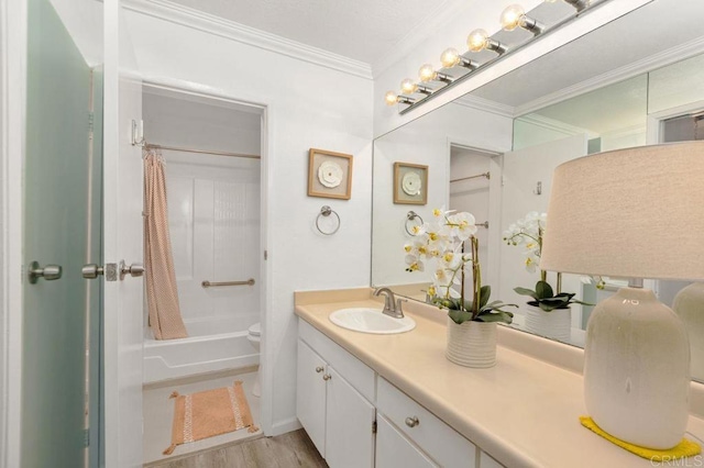 full bathroom with toilet, vanity, crown molding, hardwood / wood-style flooring, and shower / tub combo with curtain