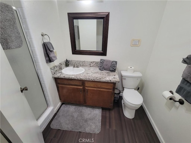 45412 N Oakview Dr, Oakhurst, CA 93644 - bathroom with wood finished floors, vanity, and a shower stall