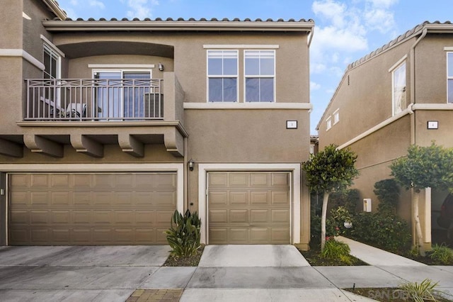 view of front of property with a garage