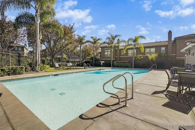 view of pool with a patio area