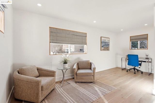 sitting room featuring light hardwood / wood-style floors