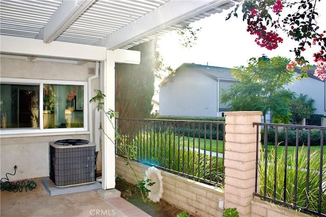 view of home's exterior with central AC