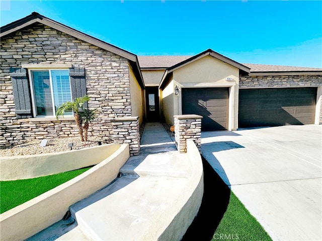 ranch-style home featuring a garage