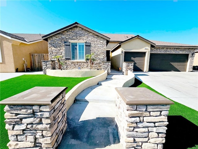 view of front of house with a front lawn and a garage