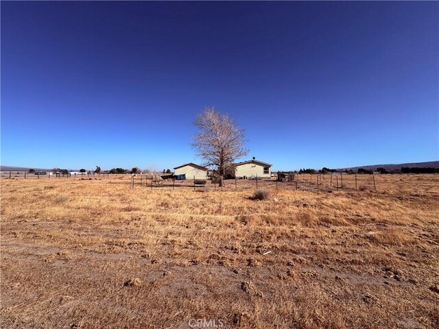 view of yard featuring a rural view