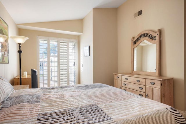 bedroom with vaulted ceiling