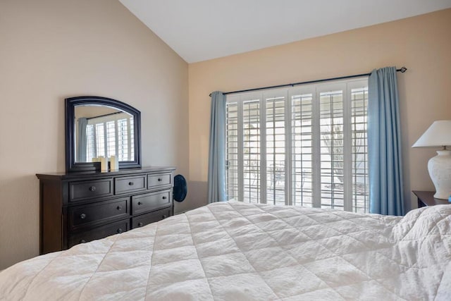 bedroom with vaulted ceiling