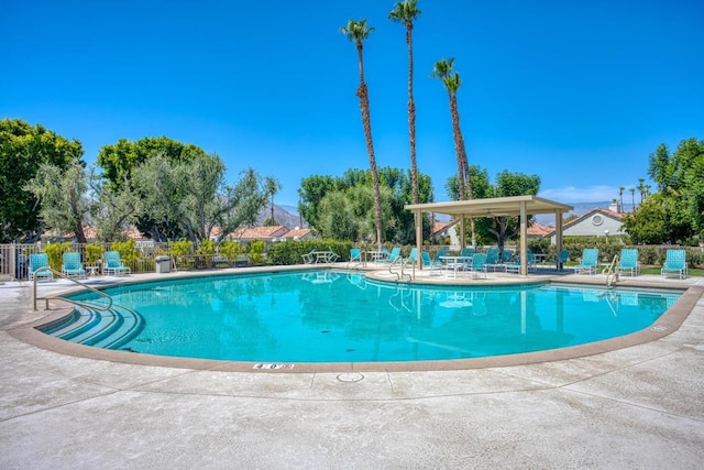 view of swimming pool featuring a patio