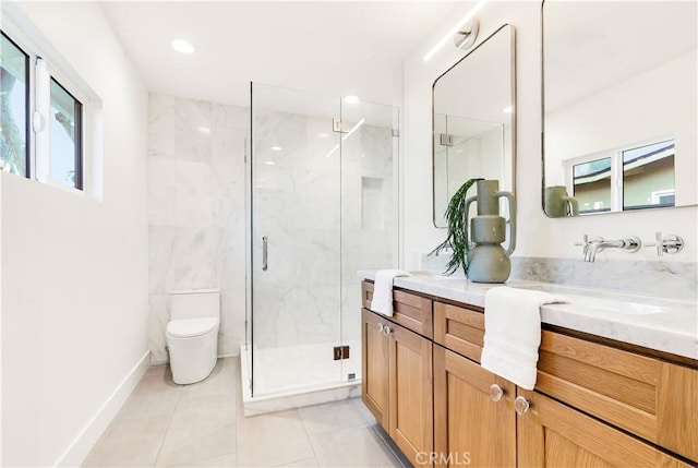 bathroom featuring walk in shower, tile patterned floors, vanity, and toilet