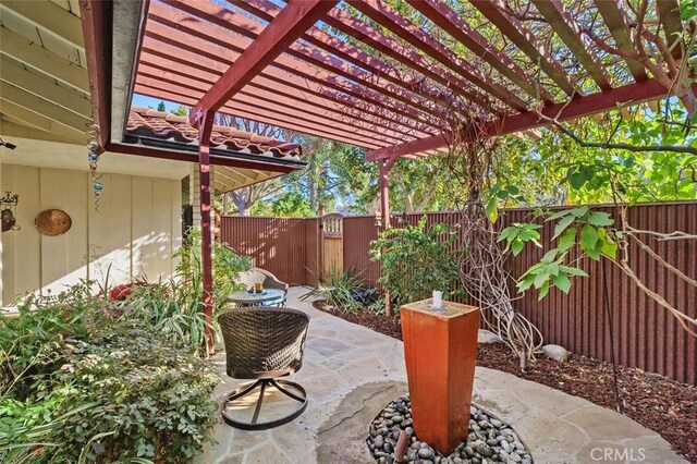 view of patio featuring a pergola