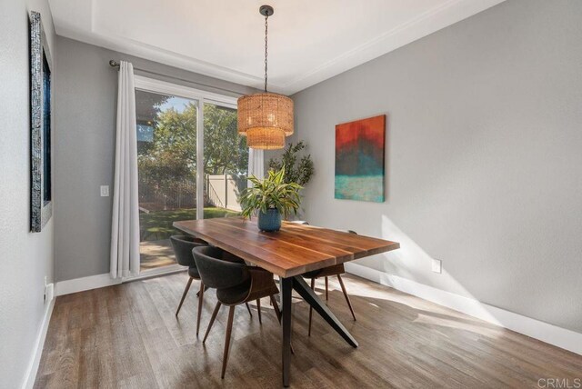 dining area featuring hardwood / wood-style floors