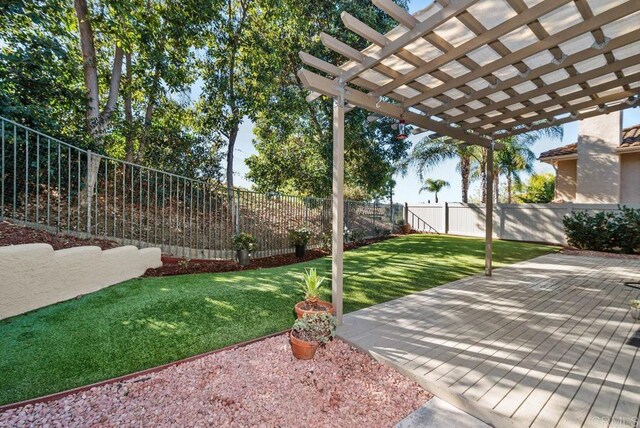 view of yard featuring a patio area and a pergola