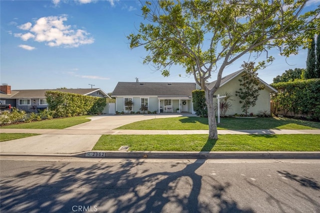 single story home with a front yard