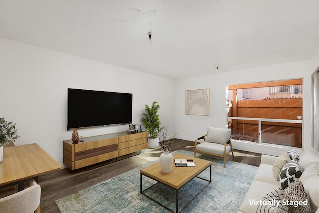 living room featuring dark hardwood / wood-style floors