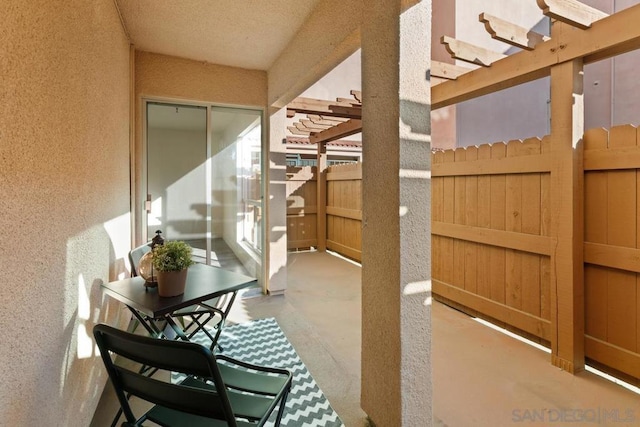 balcony with a patio and a pergola