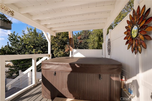 deck with a hot tub