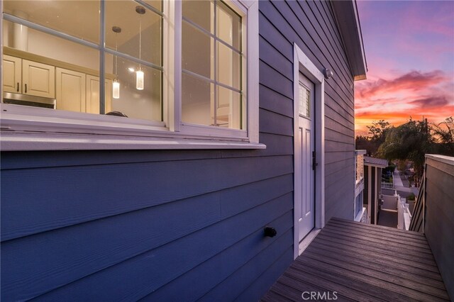 view of property exterior at dusk