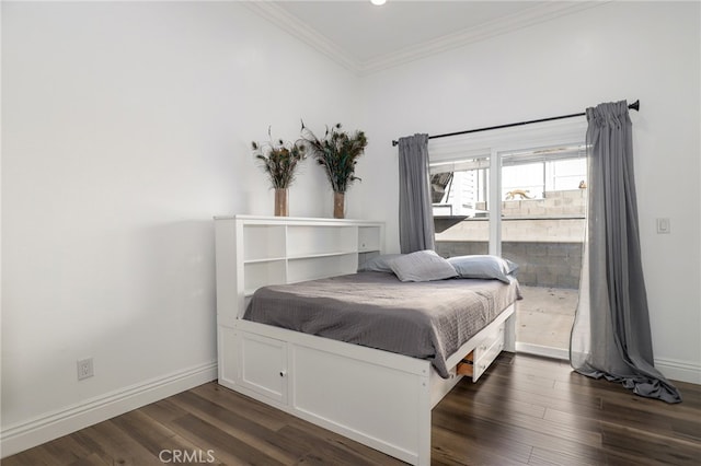 bedroom featuring dark wood-type flooring and crown molding