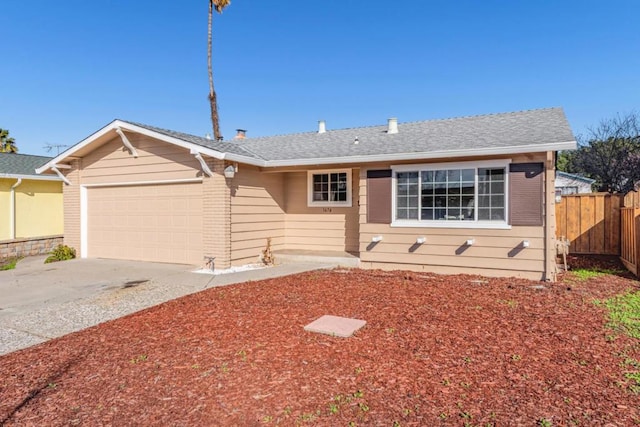 single story home featuring a garage