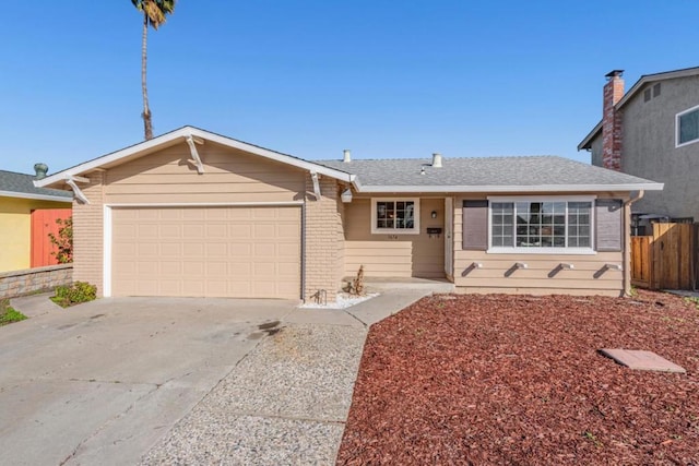 single story home with a garage