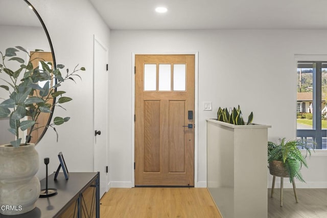 entrance foyer featuring light hardwood / wood-style floors