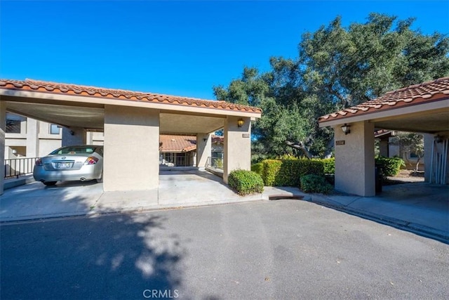 exterior space featuring a carport