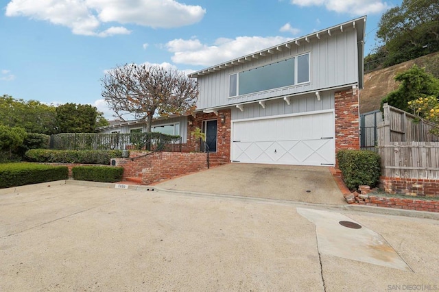 view of front of property with a garage