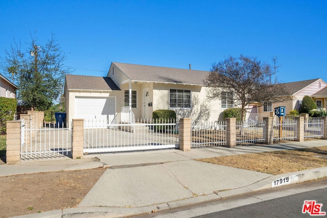 ranch-style home featuring a garage