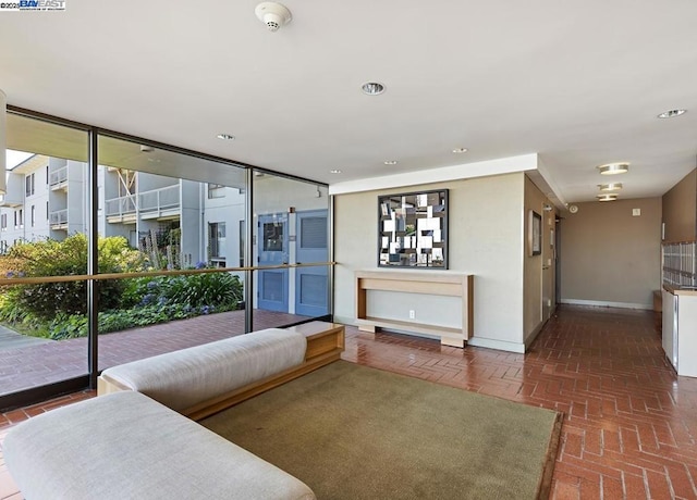 unfurnished living room featuring a healthy amount of sunlight