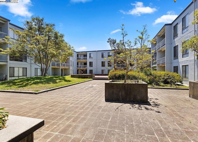 view of community featuring a lawn