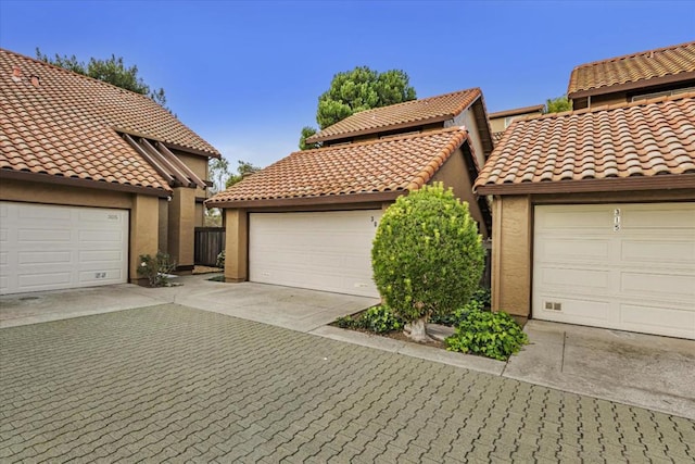 view of front of property featuring a garage